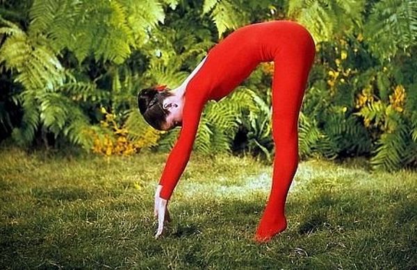 33-2273 Audrey Hepburn doing exercises on the MGM set of "Green Mansions"