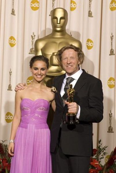 Photo: For Achievement in cinematography the Oscarè goes to cinematographer Anthony Dod Mantle, left, posing with presenter Natalie Portman, right, for the work done on "Slumdog Millionaire" (Fox Searchlight) during the live ABC Television broadcast of the 81st Annual Academy Awardsè from the Kodak Theatre In Hollywood, CA Sunday, February 22, 2009. Photo: For Achievement in cinematography the Oscarè goes to cinematographer Anthony Dod Mantle, left, posing with presenter Natalie Portman, right, for the work done on "Slumdog Millionaire" (Fox Searchlight) during the live ABC Television broadcast of the 81st Annual Academy Awardsè from the Kodak Theatre In Hollywood, CA Sunday, February 22, 2009.