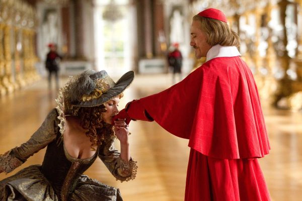 Still of Milla Jovovich and Christoph Waltz in The Three Musketeers