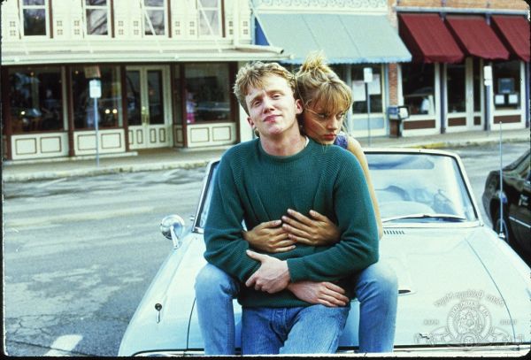 Still of Uma Thurman and Anthony Michael Hall in Johnny Be Good