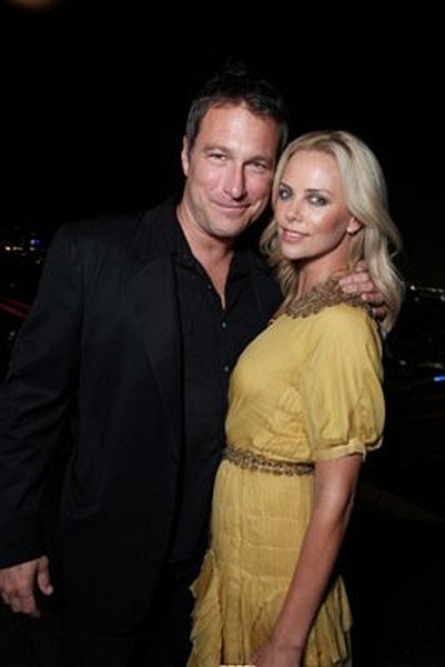 Charlize Theron and John Corbett at event of The Burning Plain