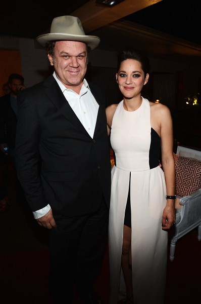 Photo: John C. Reilly and Marion Cotillard at event of Rust and Bone