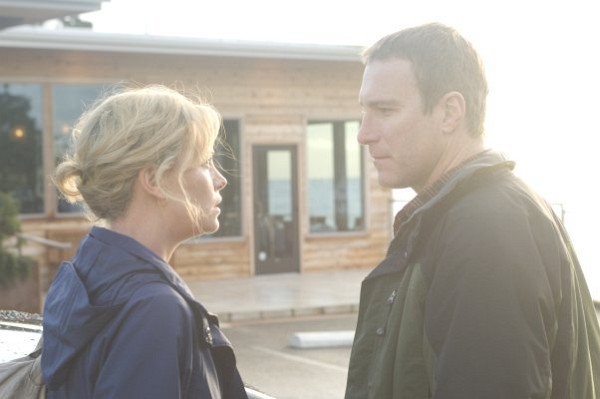 Still of Charlize Theron and John Corbett in The Burning Plain