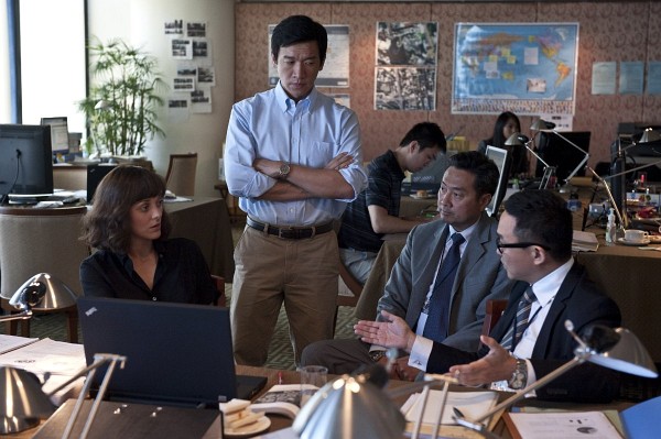 Photo: Still of Marion Cotillard and Chin Han in Contagion