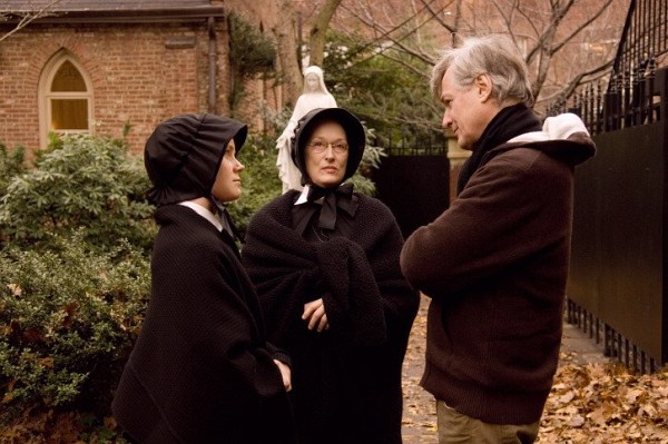Still of Meryl Streep, Amy Adams and John Patrick Shanley in Doubt