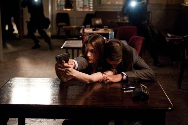 Still of Anne Hathaway and Burn Gorman in The Dark Knight Rises