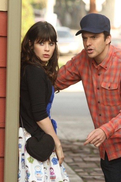 Still of Zooey Deschanel and Jake Johnson in New Girl