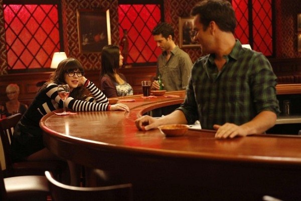 Still of Zooey Deschanel and Jake Johnson in New Girl