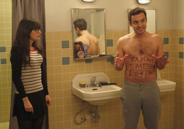 Still of Zooey Deschanel and Jake Johnson in New Girl