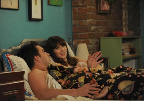 Still of Zooey Deschanel and Jake Johnson in New Girl
