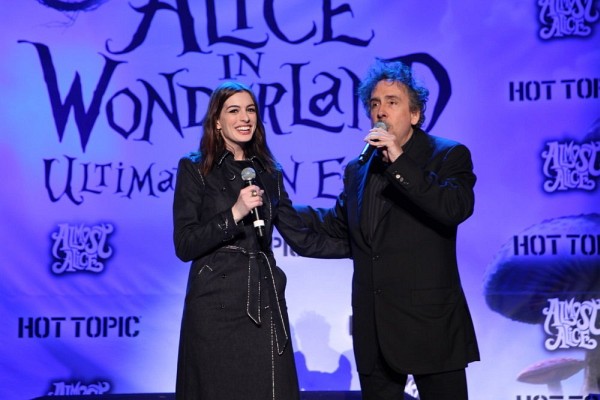 Tim Burton and Anne Hathaway at event of Alice in Wonderland