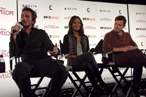 Christian Bale, Casey Affleck and Zoe Saldana at event of Out of the Furnace
