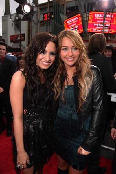 Miley Cyrus and Demi Lovato at event of Hannah Montana: The Movie