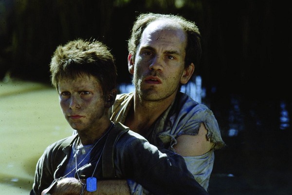 Still of Christian Bale and John Malkovich in Empire of the Sun