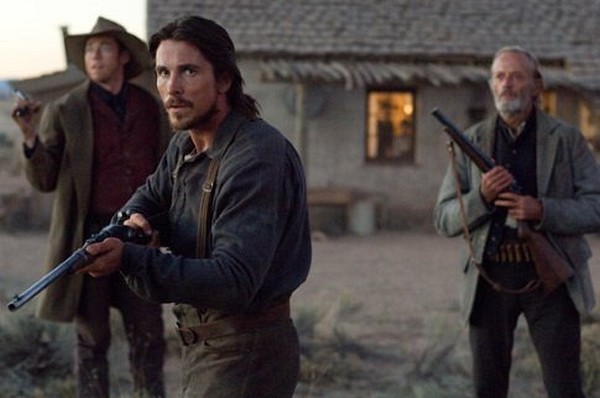 Still of Christian Bale and Peter Fonda in 3:10 to Yuma