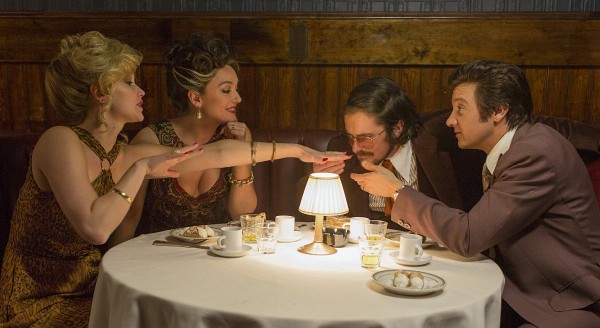 Still of Christian Bale, Jeremy Renner, Elisabeth Röhm and Jennifer Lawrence in American Hustle