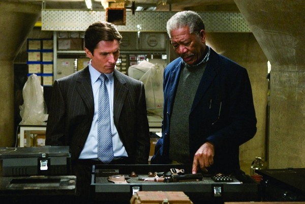 Still of Morgan Freeman and Christian Bale in Batman Begins